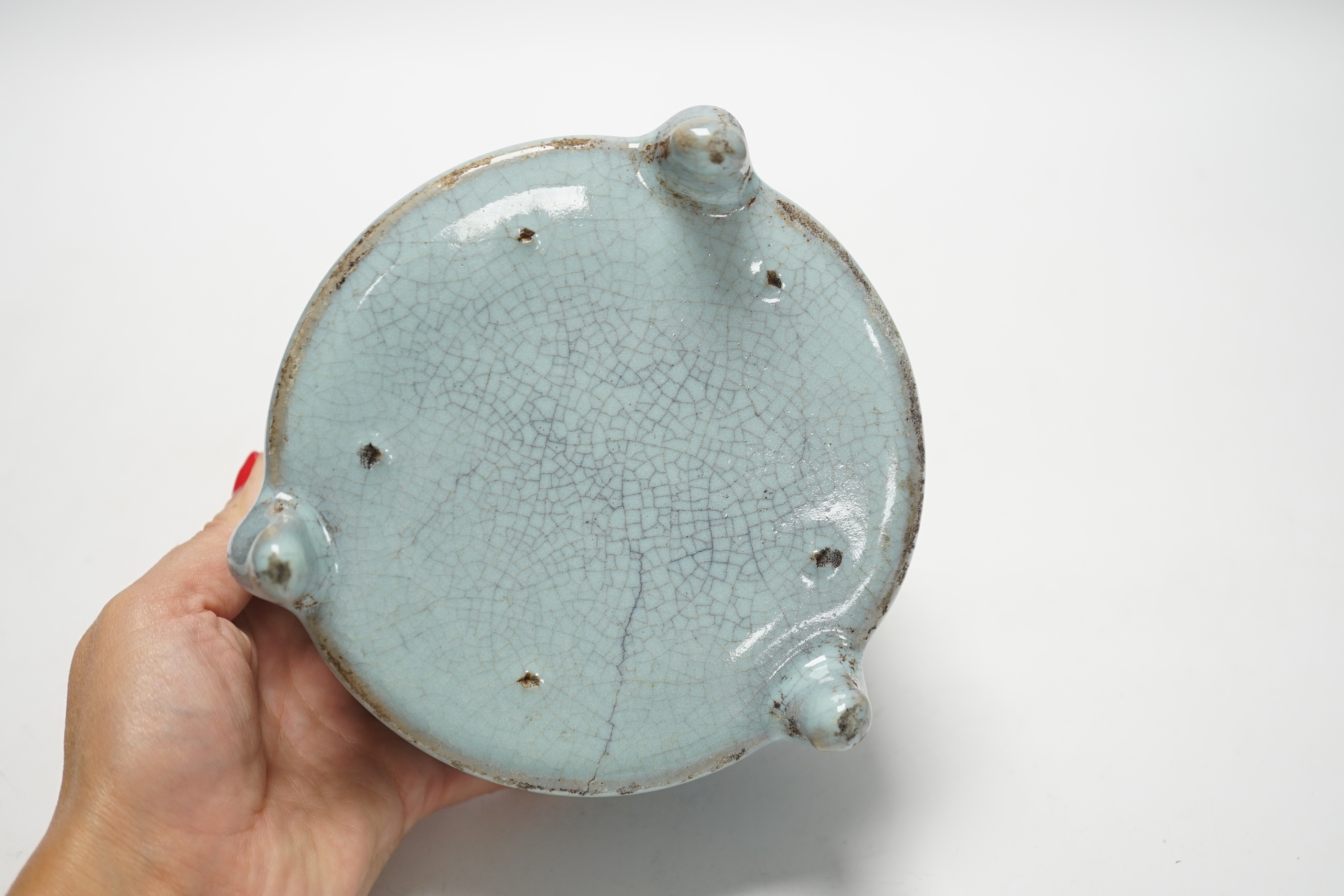 A Chinese Jun type tripod censer, 10cm tall